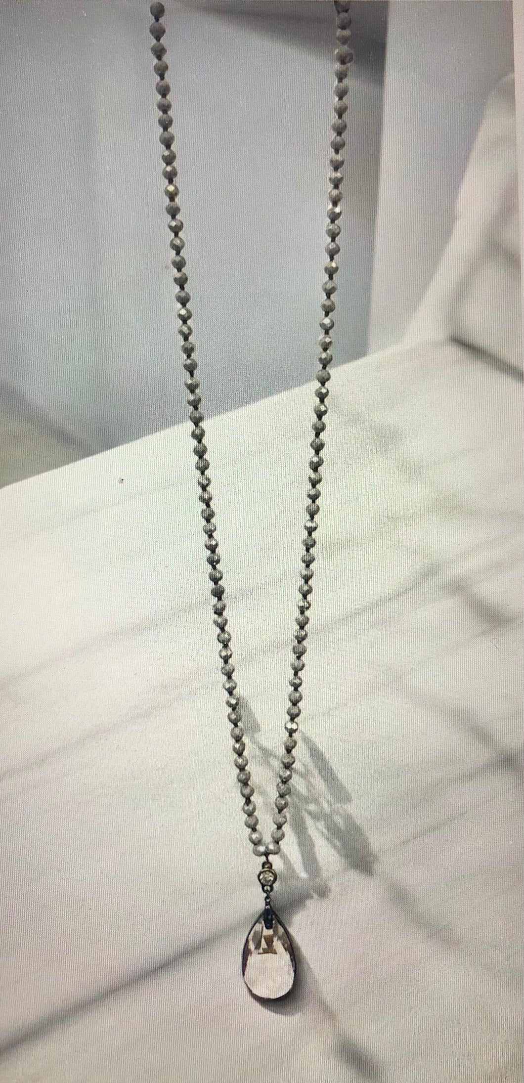 Long Crystal Necklace with Teardrop Pendant