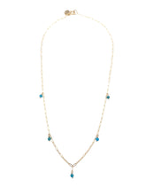 Load image into Gallery viewer, Necklace with blue beads on a white background
